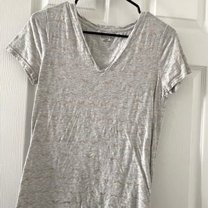 Small Short sleeve shirt! With little golden designs on it